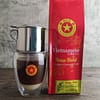 A bag of House blend Vietnamese coffee. Pictured with coffee glass and Phin filter.